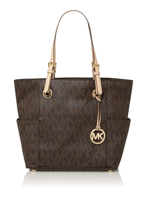 michael kors monogram tote sale|Michael Kors brown tote bag.